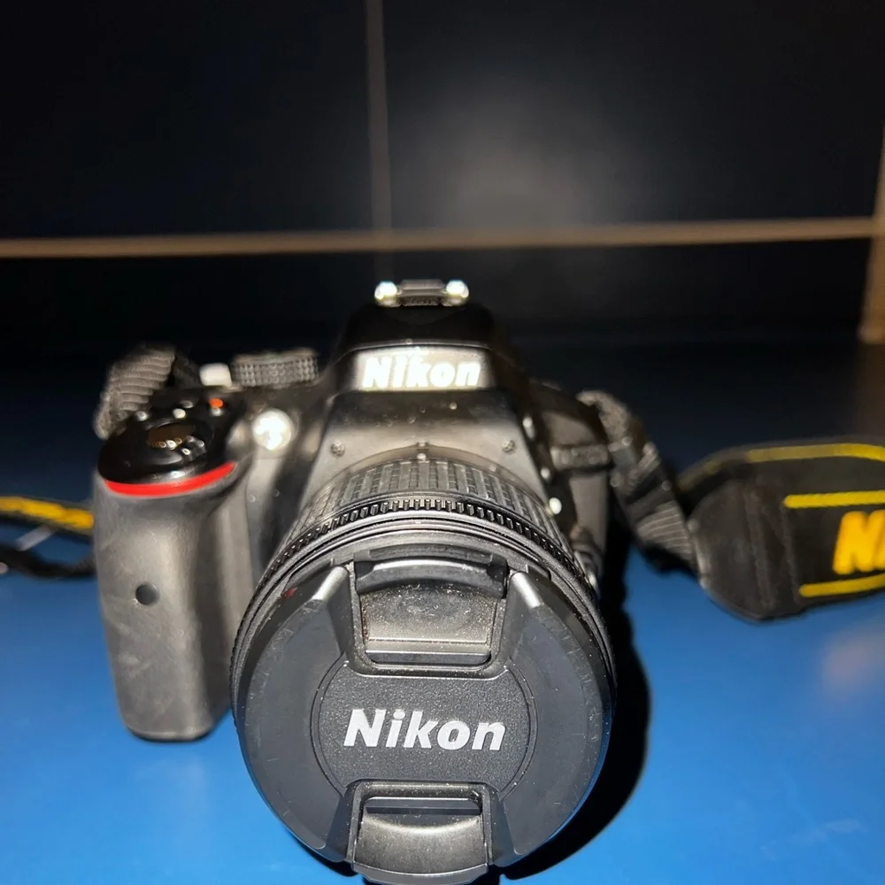 Nikon d5300, 55mm,200mm battery and charger. Camera bag included